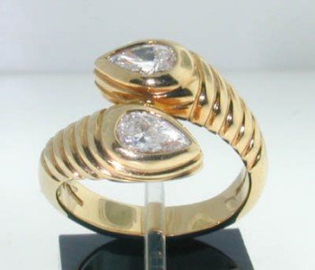 Bvlgari 18K Yellow Gold Diamond Ring.: This is a Bvlgari 18K Yellow Gold Diamond Ring. The total Ring's weight is 8.6 grams. The weight of Diamond: 1.2 cts, G color, VS clarity Ring size is 6"