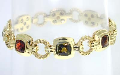 David Yurman 18K Yellow Gold Citrine Bracelet: David Yurman 18K Yellow Gold Multi-color Citrine Bracelet Bracelet's Weight : 41.4 grams. 7 Multi-color Citrine, size : 7 x7 mm The length of the Bracelet is 7.5". thickness of chain is 5 mm.