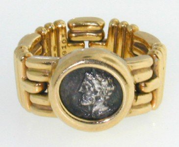 Bvlgari 18K Yellow Gold Ring.: This is a Bvlgari 18K Yellow Gold Ring. The total Ring's weight is 16.3 grams. The ring face is 11 mm wide Ring size is 5.75"