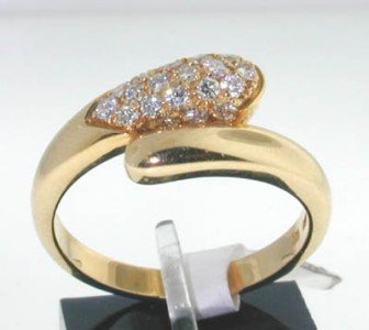 Bvlgari 18K Yellow Gold Diamond Ring : Authentic Bvlgari 18K Yellow Gold Diamond Ring The total ring's weight is 5.7grams. The diamonds weight are approximately 0.4 ct., G color and VVS clarity. The size of the ring is 7.25 There are stamp