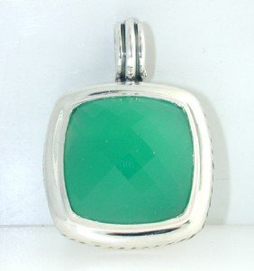 David Yurman Silver Green Onyx Pendant: David Yurman Silver Green Onyx Pendant. The total Pendant's weight is 18 grams. The size of the Green Onyx is 20 mm in diameter. The size of the Pendant is 35 x 25 mm, Thickness: 6 mm.