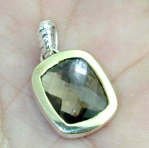 David Yurman Silver & 18K Yellow Gold Quartz Pendan: This is a Wonderful David Yurman Silver & 18K Yellow Gold Quartz Pendant The total Pendant's weight is 4.1 grams. Pendant size is 20x13 mm, 6 mm thick. The size of quartz is 11x9 mm. This is a beautif