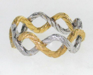 Buccellati 18K Two-toned Gold Ring.: Buccellati 18K Two-toned (White & Yellow) Gold Ring. The total ring's weight is 4.2 grams. The size of the ring is 6.25 This is a wonderful ring !