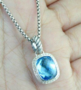 David Yurman Silver Blue Topaz & Diamond Necklace.: David Yurman Silver Blue Topaz & Diamond Necklace. The total weight of Necklace is 11.7 grams. The total diamond weight : 0.30 cts. I color, SI clarity The size of the Blue Topaz is 11 x 9 mm in diame