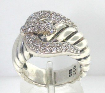 David Yurman Silver Diamond Ring: David Yurman Silver Diamond Ring The total ring's weight is 12.6 grams. Total weight of Diamond: 0.66 cts, approximately, I color, SI clarity The size of the ring is 6