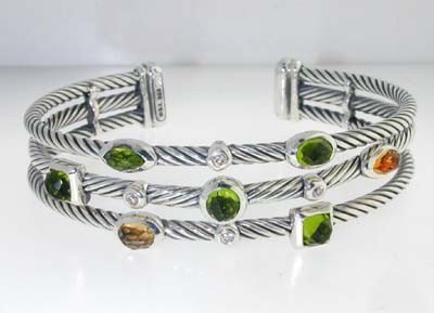 David Yurman Silver Diamond, Peridot, Citrine Bang: David Yurman silver Diamond,Peridot, Citrine Bangle. Bangle's Weight : 33.4 grams. The weight of diamond:0.2cts, H color,VS clarity. The measurements of Peridot: 5x5mm The measurements of Citrine:6x2m
