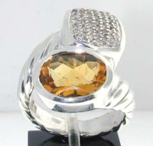 David Yurman Silver Citrine Diamond Ring: This is a Wonderful David Yurman Silver Citrine Diamond Ring. The total ring's weight is 10.7 grams. The total diamond weight is 0.5 ct ,approximately. H color VS clarity. The size of Citrine: 12x10 m