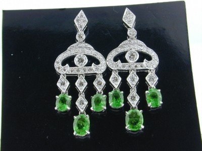 18K White Gold Diamond Tsavorite Earrings: 18K White Gold Tsavorite & Diamond Earrings!The total earrings weight is 7.5 grams.Total weight of Tsavorite is 1.7 cts. approximately.The size of Tsavorite is 5x4, each.Total diamond weight are 1.25