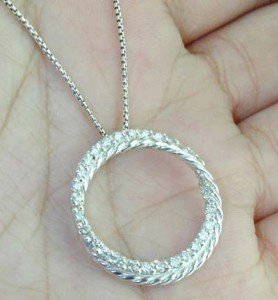 David Yurman Silver Diamond Necklace.: David Yurman Silver Diamond Necklace.The total weight of Necklace is 5.5 grams.Total weight of diamond are 0.6 cts, approximately, H color, VS clarity.The size of the pendant is 26 mm.The length of ch
