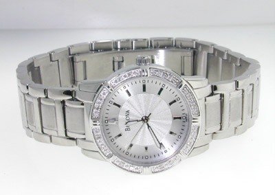 Bulova Stainless Steel Watch: Brand New Bulova Stainless Steel Watch The total watch's weight is 70.7 grams. The measurements of watch head is 25 x 25 mm and 6 mm thick. The length of watch: 6" water resistant Chain is 13 mm wide