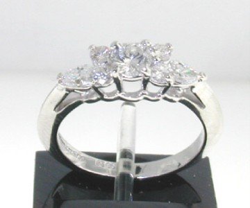Tiffany & Co Platinum Diamond Ring.: Tiffany & Co Platinum Diamond Ring. The total ring's weight is 3.3 grams. The weight of Diamond is approximately 0.49 cts . G color VS-2 clarity. The size of the ring is 3"