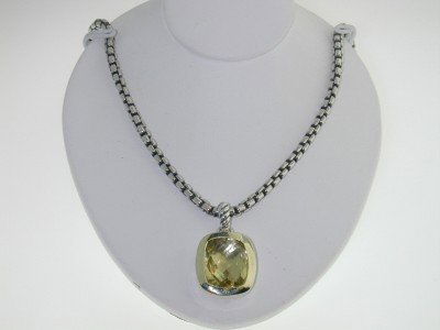 David Yurman 18K Gold, Silver, Lemon Citrine Neckl: David Yurman 18K Yellow Gold, Silver, Lemon Citrine Necklace. The total weight of Necklace is 19.4 grams. The size of the Lemon Citrine is 10 x 8 mm in diameter. The size of the pendant is 17 x 12 mm,