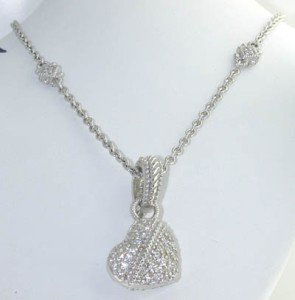 Judith Ripka Silver CZ Necklace: Judith Ripka Silver CZ Necklace Necklace's Weight : 17.7 grams. The length of necklace is 17" long Total weight of Cz: 1.2 cts. Size of pendant: 30x 16 mm