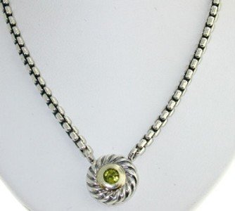 David Yurman Silver, Peridot Necklace.: David Yurman Silver, Peridot Necklace. The total weight of Necklace is 14.5 grams. The size of the Peridot is 3 mm in diameter. The size of the pendant is 13 x 10 mm, Thickness is 2 mm. The size of th