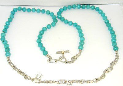 Judith Ripka Silver, Turquoise Necklace.: Judith Ripka Silver,Turquoise Necklace. The total weight of Necklace is 131.6 grams. The size of Turquoise: 10 mm in diameter. The Necklace is 44" long.