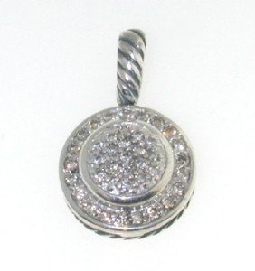 David Yurman Silver Diamond Pendant: David Yurman Silver Diamond Pendant. The total Pendant's weight is 3.6 grams. The total weight of diamonds is 0.73 cts. approximately I and SI clarity. The size of the Pendant is 21 x 14 mm, Thickness