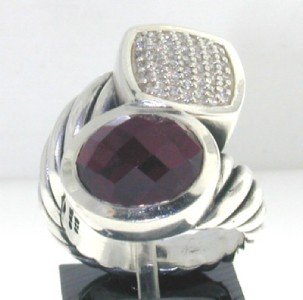 David Yurman Silver, Smoky Topaz & Diamond Ring: David Yurman Silver, Smoky Topaz & Diamond Ring. . The total ring's weight is 13.1 grams. The total diamond weight is 0.5 ct ,approxmiately. H color SI clarity. The size of Smoky Topaz is 10 x 8 mm. T