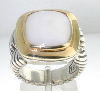 David Yurman 18K Gold/ Silver White Coral Ring.: David Yurman 18K Yellow Gold/Silver White Coral Ring. The total ring's weight is 15.1 grams. The size of the White Coral is 8 x 8 mm. There is D.Y',925" 750"stamp on it. The size of the ring is 7.25"