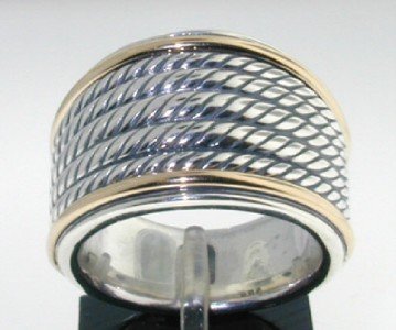 David Yurman Silver, 18K Yellow Gold Ring: David Yurman Silver,18K Yellow Gold Ring.The total ring's weight is 17.8 grams.The size of the ring is 6.25"
