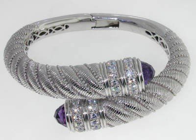 Judith Ripka Silver Amethyst & Diamonique Bangle!: Judith Ripka Silver Amethyst & Diamonique (CZ'S) Bangle!Bangle's Weight : 60.5 grams. The measurements of Amethyst:7mm.The weight of Diamonique (CZ'S): 1.7cts.The inside measurements of the Bangle are