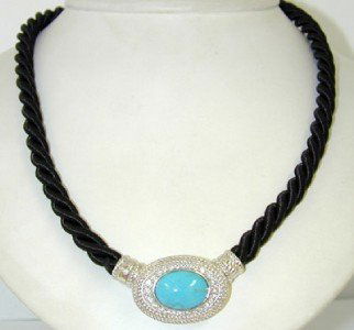 Judith Ripka Silver, Turquoise & CZ Necklace: Judith Ripka Silver,Turquoise & CZ Necklace.The weight of necklace is 29.4 grams.The total weight of Diamonique (CZ'S): 0.72cts.The measurements of Turquoise: 15 x 10 mm.The size of the pendant is 30