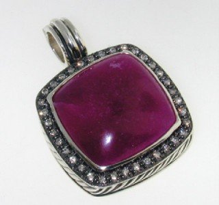 David Yurman Silver, Cabochon Ruby & Diamond Penda: David Yurman Silver, Cabochon Ruby & Diamond Pendant! The total Pendant's weight is 17 grams.Pandent size is 35 x 25 mm, Thickness: 6 mm.The size of Cabochon Ruby is 20 mm in diameter. The total weigh