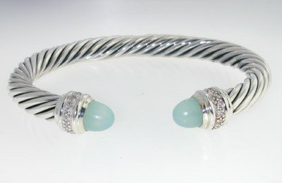 David Yurman Silver Chalcedony, Diamond Bangle!: David Yurman Silver Chalcedony, Diamond Bangle.Bangle's Weight : 40.2 grams.The total diamond weight: 0.48 cts. I color, SI clarity.The size of Chalcedony : 6 mm.The measurements of the Inside Bangle