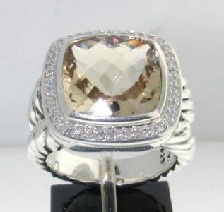 David Yurman Silver Citrine Diamond Ring.: David Yurman Silver Citrine Diamond Ring. The total ring's weight is 14.9 grams. The total weight of the diamond is 0.45 cts approximately, H color VS clarity. The size of the Citrine is 14x 14 mm. Th