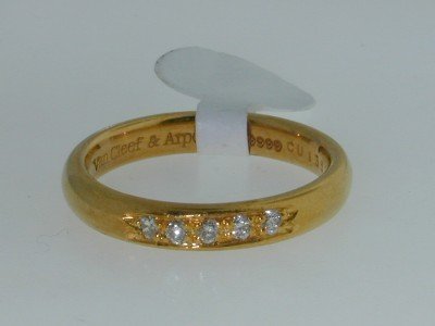 Van Cleef & Arpels 18k Yellow Gold Diamond Ring: This is a Wonderful Van Cleef &Arpels 18k Yellow Gold Diamond Ring, The total ring's weight is 9.9 grams The total diamond weight is 25 pts approxmiately, H color VS clarity. The size of the ring is 1