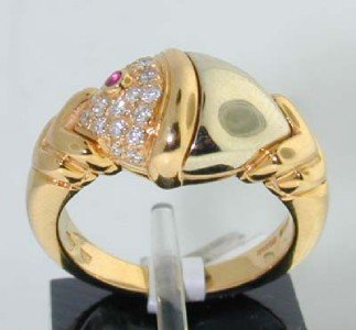 Bvlgari 18K Yellow Gold Ruby & Diamond Ring: Authentic Bvlgari 18K Yellow Gold Cabochon Ruby & Diamond Ring The diamonds weight are approximately 0.36 cts., G color and VS clarity. The size of the ring is 4.5. There are stamp "750" and "Bvlgari"