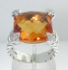 David Yurman Silver Citrine & Diamond Ring.: This is a Wonderful David Yurman Silver Citrine & Diamond Ring. The total ring's weight is 9 grams. The total weight of the diamond is 0.25 cts approximately, H color VS clarity. The size of the Citri