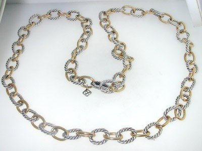 David Yurman Silver, 18K Yellow Gold Necklace.: David Yurman Silver,18K Yellow Gold Necklace. The total weight of Necklace is 116.4 grams. The length of the necklace is 29" inches long.
