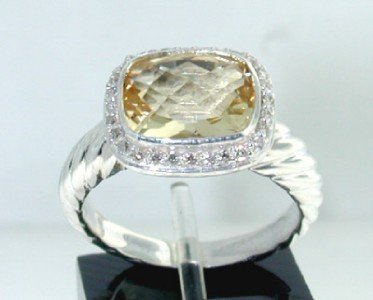 David Yurman Silver Citrine Diamond Ring: David Yurman Silver Citrine Diamond Ring The total ring's weight is 5.5 grams. The total weight of the diamond is 0.24 cts approximately, I color SI clarity. The size of the Citrine is 10 x 8 mm. The 
