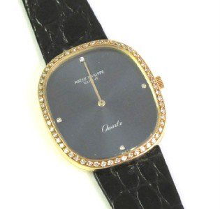 Patek Philippe 18K Gold, Diamond, Leather Strap wa: Patek Philippe 18K Yellow Gold, Diamond, Leather Strap watch with Certificate The total watch's weight is 44.7 grams. The total weight of diamond: 0.41 cts. G-H color VS clarity The measurements of wa