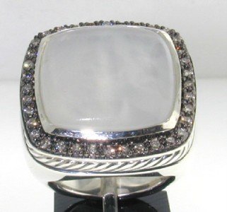 David Yurman Silver, Moon Quartz & Diamond Ring: David Yurman Silver, Moon Quartz & Diamond Ring The total ring's weight is 24.9 grams. The total weight of the diamond is 0.52 cts approximately, H color SI clarity. The size of the Moon Quartz is 18 