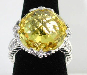 Judith Ripka Silver Citrine & Diamonique Ring: Judith Ripka Silver Citrine & Diamonique (CZ'S) Ring The total ring weight is 12.0g The measurements of Citrine: 16 mm The total weight of Diamonique(CZ'S): 0.44cts The size of ring: 6