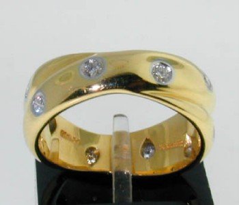 Tiffany &Co 18k Yellow Gold Diamond Ring: Tiffany&Co 18K Yellow Gold Diamond Ring The total earring's weight is 6.5grams. The total weight of Diamond:0.6cts, G color, VS clarity The size of ring : 5.25