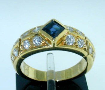 Van Cleef & Arpels 18k Gold Diamond and Sapphire R: Van Cleef & Arpels 18k Yellow Gold Diamond and Sapphire. The total ring's weight is 6.1 grams. The weight of Diamond: 0.8cts, approoximately H color, VS calarity The weight of Sapphire: 0.35cts The si