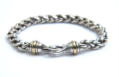 David Yurman Silver/18K Yellow Gold Bracelet: David Yurman Silver/18K Yellow Gold Bracelet The total weight of bracelet is 28.7 grams. The length of the bracelet is 6.25" inches long.