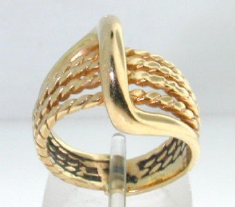 Tiffany & Co 14K Yellow Gold Ring: Tiffany & Co 14K Yellow Gold Ring. The weight of Ring is 7.8 grams. The size of Ring: 5.75".