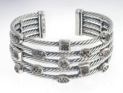David Yurman Silver, Black Diamond Bangle: David Yurman silver, Black Diamond Bangle. Bangle's Weight : 50.3 grams. The weight of Black diamond: 0.87 cts, VS clarity. The measurements of the Inside Bangle is 51 x 44 mm There is D.Y , Stemp 925