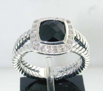 David Yurman Silver, Onyx & Diamond Ring.: David Yurman Silve, Onyx & Diamond Ring. The total ring's weight is 6.0 grams. The total weight of the diamond is 0.2 cts approximately, I color SI clarity. The size of the Onyx is 7x7 mm. The size of