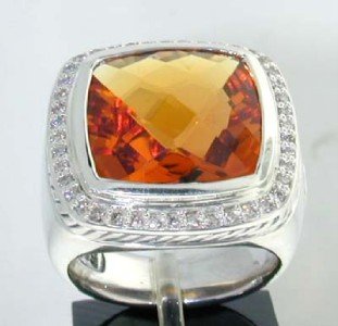 David Yurman Silver Citrine Diamond Ring.: David Yurman Silver Citrine Diamond Ring. The total ring's weight is 15.6 grams. The total weight of the diamond is 0.45 cts approximately, H color VS clarity. The size of the Citrine is 15 x 15 mm. T
