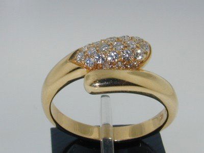 Bvlgari 18K Yellow Gold Diamond Ring: Authentic Bvlgari 18K Yellow Gold Diamond Ring. The total ring's weight is 5.7 grams. The diamonds weight are approximately 0.4 ct., G color and VVS clarity. The size of the ring is 7.5. There are sta