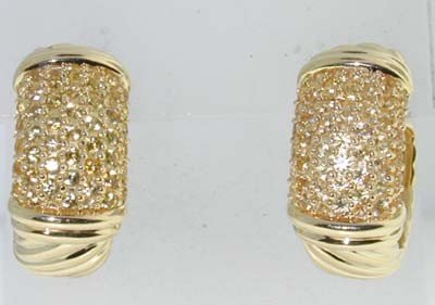 David Yurman 18K Yellow Gold & Yellow Sapphire Ear: This is David Yurman 18K Yellow Gold & Yellow Sapphire Earrings. Earring's weight:18.4grams. The weight of Yellow Sapphire: 0.6 cts. The measurements of the earrings is 21x 10 x 18 mm. D.Y stamp "750"