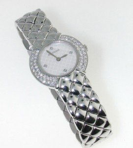 Bucherer MOP 18K White Gold Diamond Wrist Watch: Bucherer MOP 18K White Gold Diamond Wrist Watch The watch's weight is 66.8 grams. Total weight of diamond: 2 cts, approximately, G color,VVS clarity. The length of watch: 5" long, 12mm wide. Swiss Mad