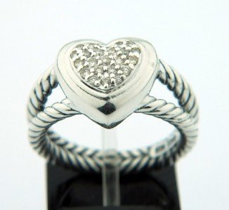 David Yurman Silver, Diamond Ring: David Yurman Silver, Diamond Ring. The total ring's weight is 7.3 grams. The total weight of diamond is 0.28 cts. approximately , I color SI clarity. The size of the ring's surface is 11 x 12 mm and 3