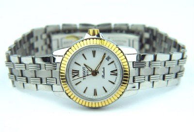 Tissot Stainless Steel Watch.: Tissot Stainless Steel Watch. The total watch's weight is 44.5 grams. The measurement of the watch head is 21 x 23 mm and 5 mm thick. The length of watch: 6" Swiss Made Water Resistant