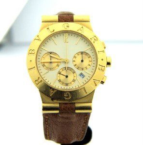 Bvlgari 18K Gold, Original Buckle & Leather Strap : Bvlgari 18K Yellow Gold, Original Buckle & Leather Strap Men's Chronograph watch.The total watch's weight is 93.2 grams. The measurement of watch head is 35 x 35 mm and 8 mm thick.The length of watch: