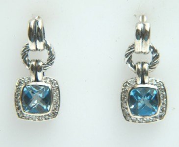 David Yurman Silver, Blue Topaz & Diamond Earrings: David Yurman Silver, Blue Topaz & Diamond Earrings. The total earrings weight is 7.1 grams. The total weight of diamond: 0.36 cts. I color, SI clarity. The size of the Blue Topaz is 6 mm. The size of 